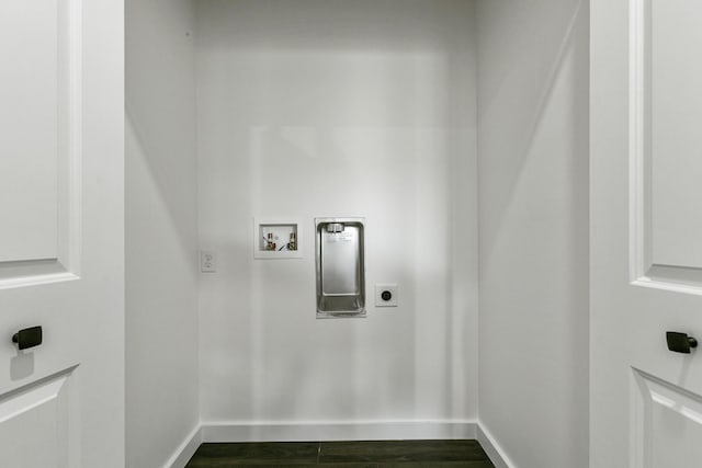 laundry room with hookup for a washing machine, dark hardwood / wood-style floors, and electric dryer hookup