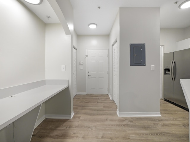 520 Florida Club Blvd Unit 310, Saint Augustine, FL 32084 - corridor with light wood-style flooring, baseboards, and electric panel