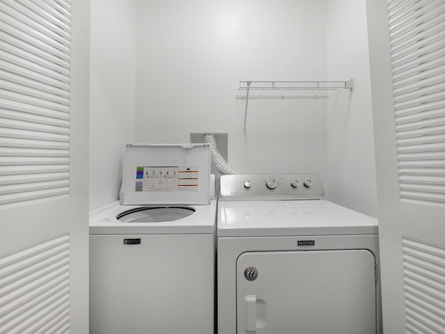 520 Florida Club Blvd Unit 310, Saint Augustine, FL 32084 - clothes washing area with separate washer and dryer and laundry area
