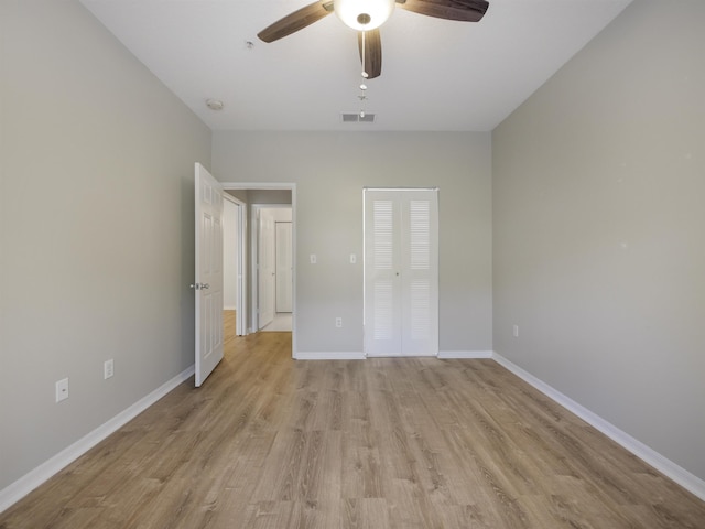 520 Florida Club Blvd Unit 310, Saint Augustine, FL 32084 - unfurnished bedroom featuring light wood finished floors, visible vents, baseboards, and a ceiling fan