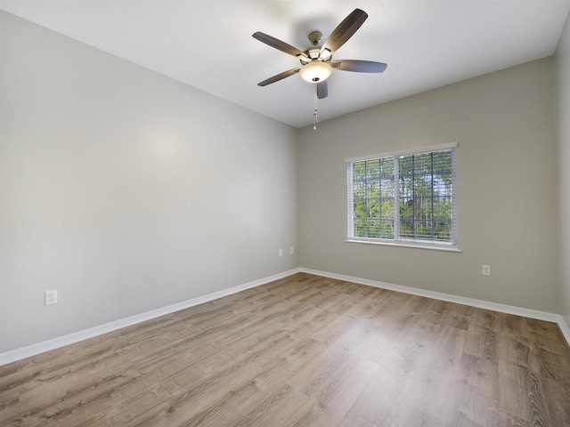 520 Florida Club Blvd Unit 310, Saint Augustine, FL 32084 - unfurnished room with wood finished floors, baseboards, and a ceiling fan