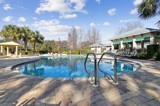 view of pool featuring a gazebo and a patio area