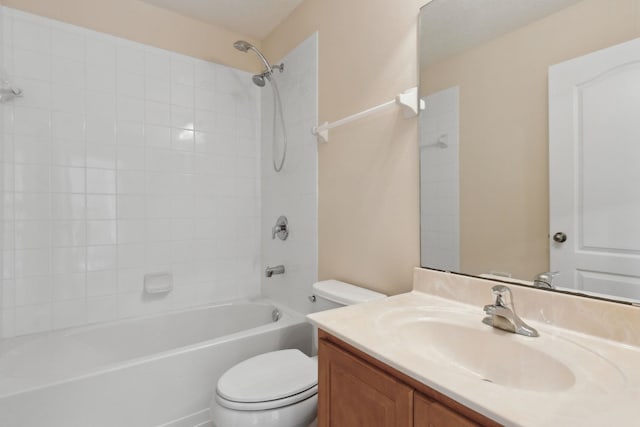 full bathroom with shower / tub combination, vanity, and toilet