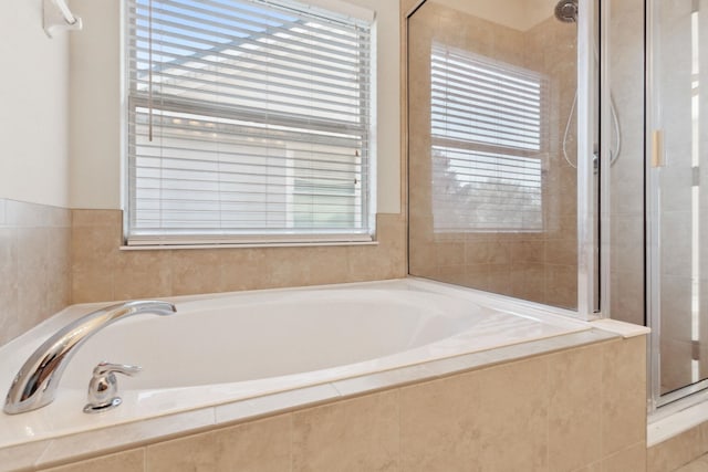 bathroom with independent shower and bath