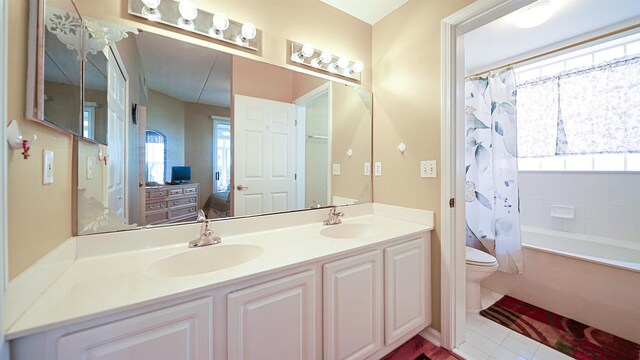 308 Augusta Cir, Saint Augustine, FL 32086 - ensuite bathroom with double vanity, toilet, a sink, and ensuite bathroom