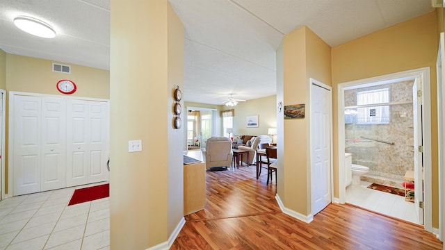 308 Augusta Cir, Saint Augustine, FL 32086 - hallway with light wood-style flooring and visible vents