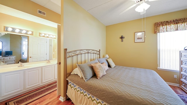 308 Augusta Cir, Saint Augustine, FL 32086 - bedroom with visible vents, wood finished floors, and multiple windows