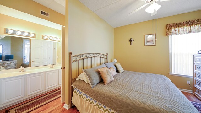 308 Augusta Cir, Saint Augustine, FL 32086 - bedroom with visible vents, wood finished floors, and multiple windows