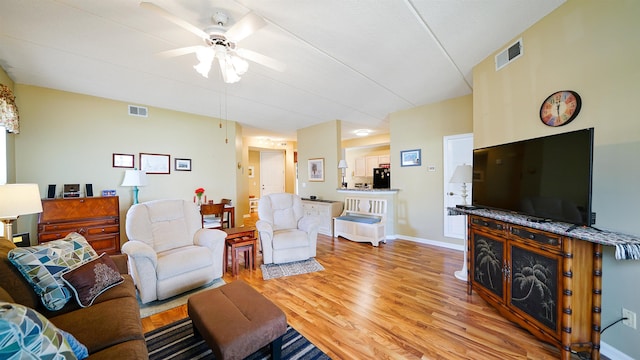 308 Augusta Cir, Saint Augustine, FL 32086 - living area with baseboards, a ceiling fan, light wood finished floors, and visible vents