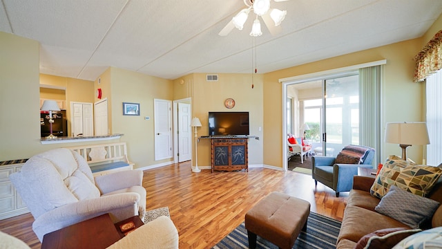 308 Augusta Cir, Saint Augustine, FL 32086 - living area featuring baseboards, ceiling fan, wood finished floors, and visible vents