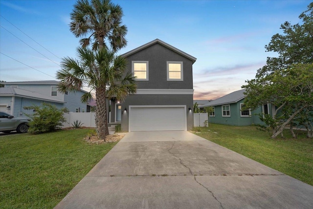 28 S Comares Ave, Saint Augustine, FL 32080 - view of front of home featuring a garage, stucco siding, and concrete driveway