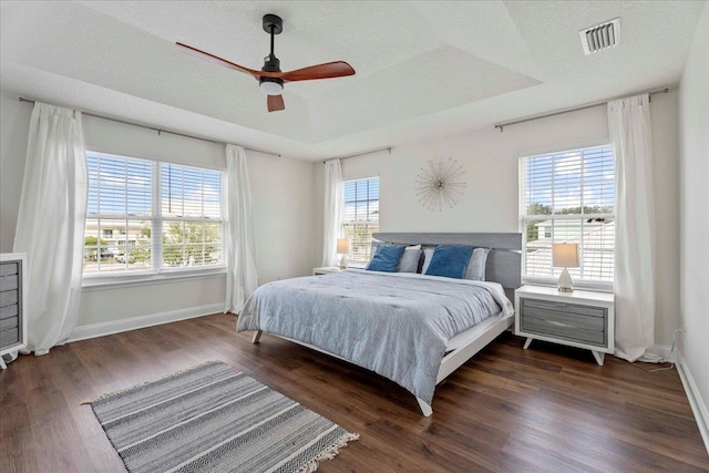 28 S Comares Ave, Saint Augustine, FL 32080 - bedroom with baseboards, wood finished floors, and ceiling fan