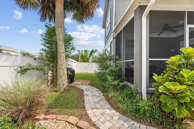 28 S Comares Ave, Saint Augustine, FL 32080 - fenced backyard featuring a sunroom