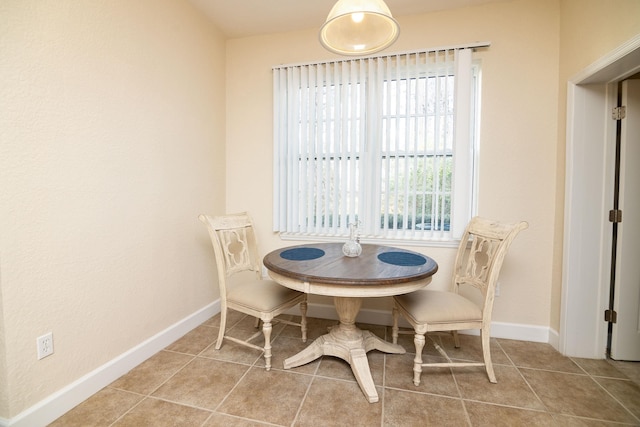 view of tiled dining space