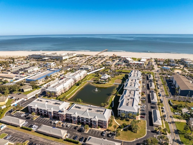 aerial view featuring a water view and a view of the beach