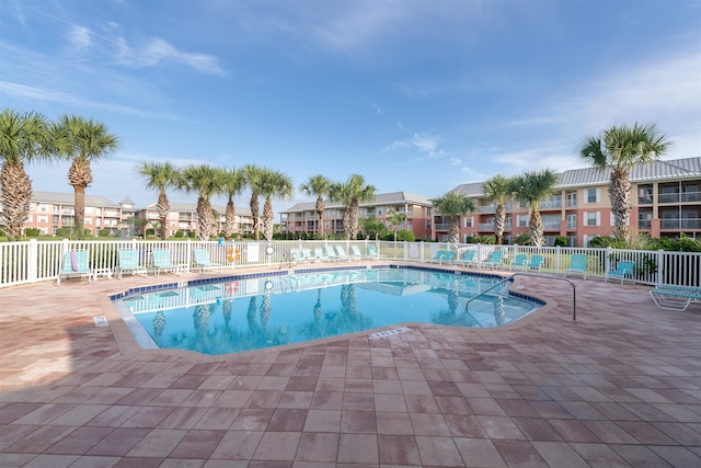 view of pool featuring a patio