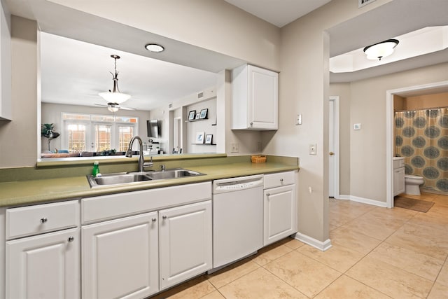 kitchen with white cabinetry, sink, ceiling fan, white dishwasher, and decorative light fixtures