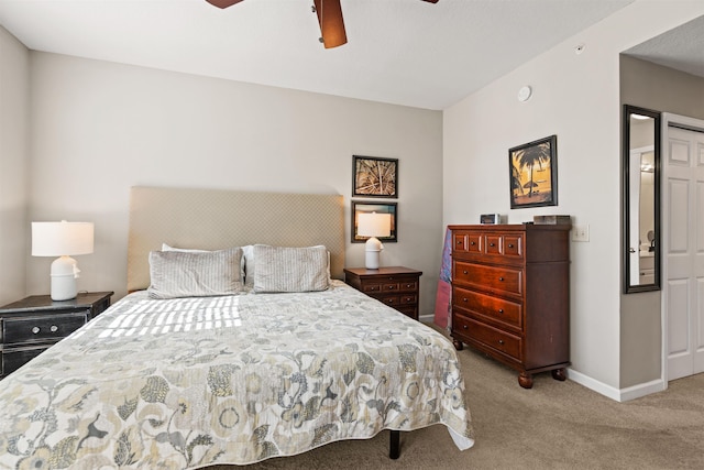 carpeted bedroom featuring ceiling fan