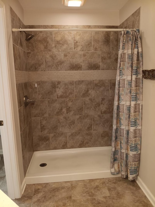 full bathroom with a stall shower