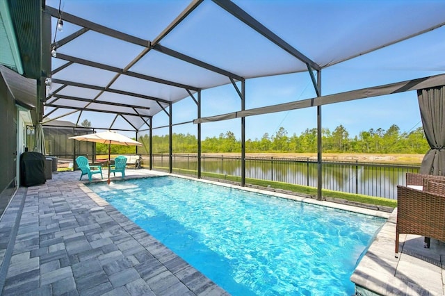 52 Lumberjack Trl, Palm Coast, FL 32137 - view of pool with a water view, a patio, a lanai, and view of scattered trees