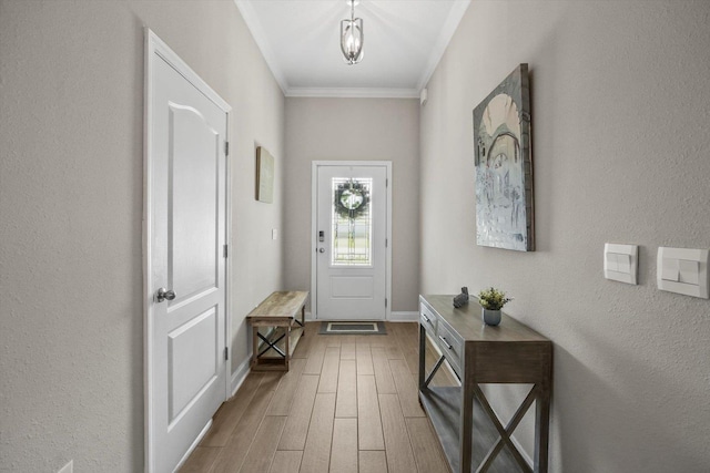 52 Lumberjack Trl, Palm Coast, FL 32137 - foyer entrance with wood finished floors and ornamental molding