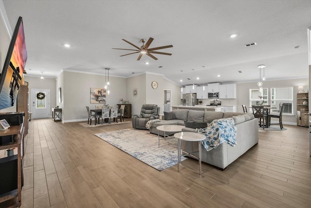 52 Lumberjack Trl, Palm Coast, FL 32137 - living area featuring ornamental molding, wood finished floors, recessed lighting, and a ceiling fan