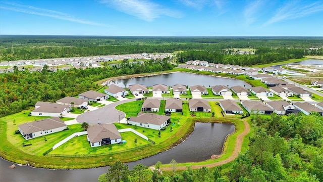52 Lumberjack Trl, Palm Coast, FL 32137 - aerial perspective of suburban area featuring a heavily wooded area and a nearby body of water