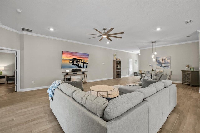 52 Lumberjack Trl, Palm Coast, FL 32137 - living room with ceiling fan, wood finished floors, ornamental molding, and recessed lighting