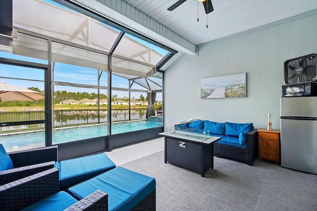 52 Lumberjack Trl, Palm Coast, FL 32137 - sunroom / solarium with outdoor lounge area, a ceiling fan, a water view, and vaulted ceiling