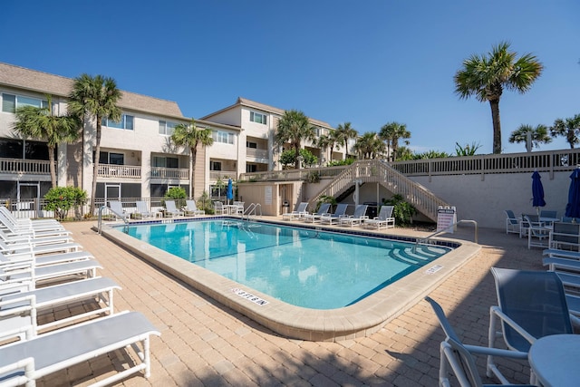 view of pool featuring a patio area