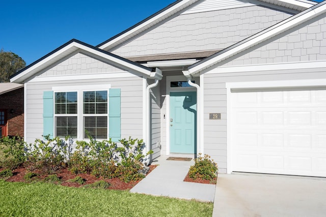 property entrance with an attached garage