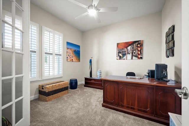 office featuring ceiling fan and light colored carpet