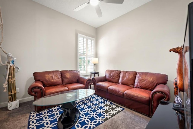 living room with lofted ceiling, carpet floors, and ceiling fan