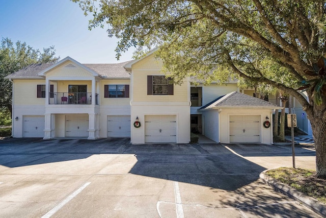 view of front of home with a balcony