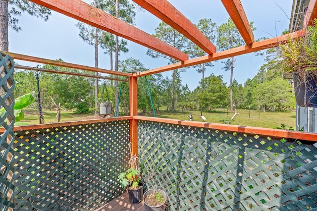 4405 Alvin St, Hastings, FL 32145 - unfurnished sunroom featuring view of scattered trees