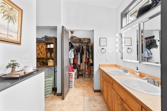 4405 Alvin St, Hastings, FL 32145 - bathroom featuring double vanity and a spacious closet