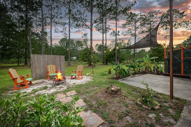 4405 Alvin St, Hastings, FL 32145 - view of grassy yard with a fire pit and a patio
