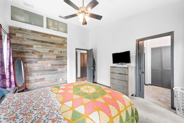 4405 Alvin St, Hastings, FL 32145 - bedroom with light colored carpet, a ceiling fan, and wooden walls