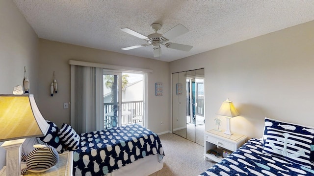 bedroom featuring baseboards, a ceiling fan, carpet, access to outside, and a textured ceiling