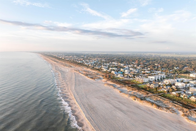 bird's eye view featuring a beach view and a water view