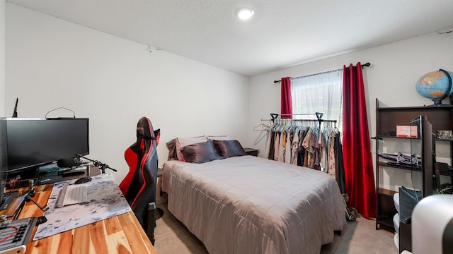 bedroom featuring light tile patterned floors