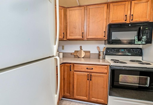 kitchen featuring white appliances