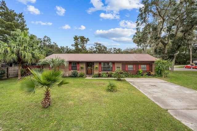 ranch-style house with a front yard