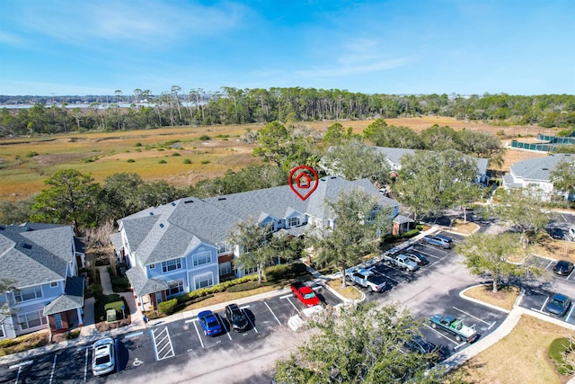 birds eye view of property with a residential view