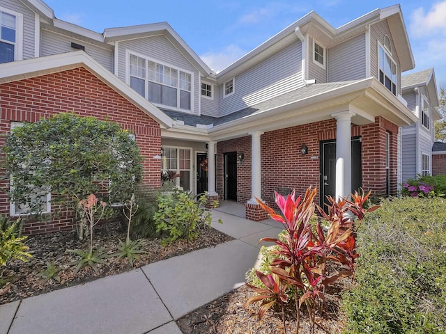 view of front of property with brick siding