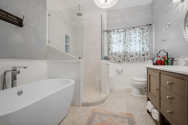 full bathroom with toilet, shower with separate bathtub, vanity, and tile patterned floors