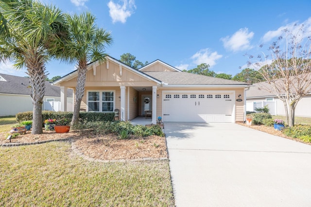 ranch-style house with fence, board and batten siding, concrete driveway, a front yard, and a garage