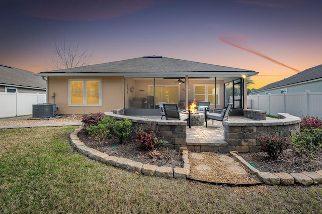 back of house with a patio area, fence, central AC, and an outdoor fire pit