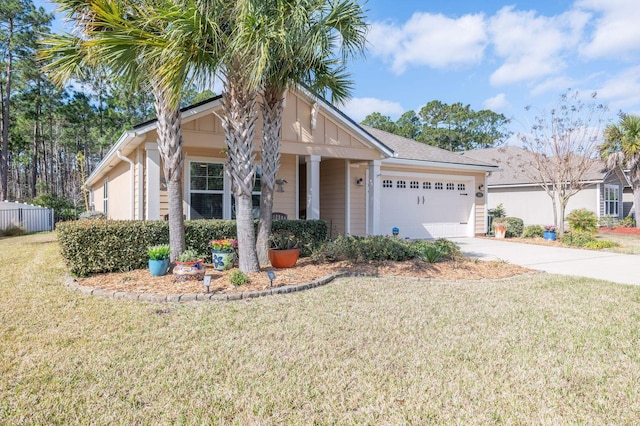 ranch-style home with a front lawn, an attached garage, and concrete driveway