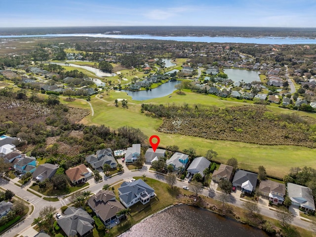 bird's eye view featuring a residential view and a water view